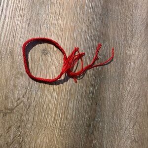 Red yarn bracelet